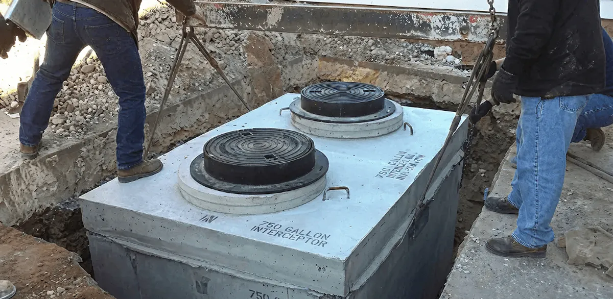 Grease trap installation for a commercial property drainage system in Raleigh, NC