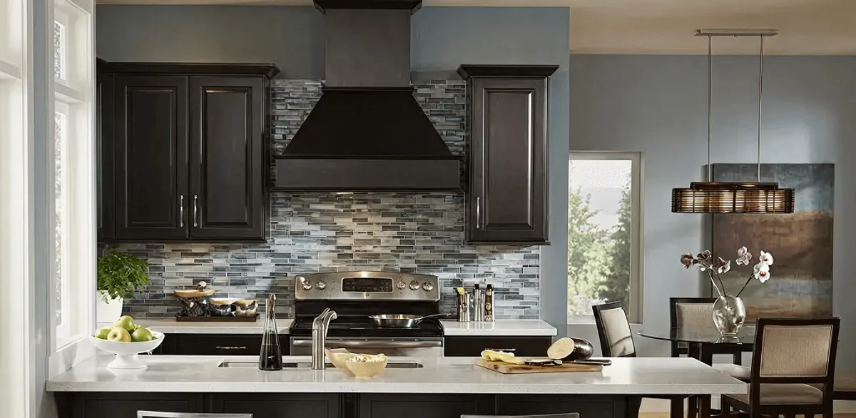Kitchen cabinet painting and refinishing in a modern kitchen in Raleigh, NC
